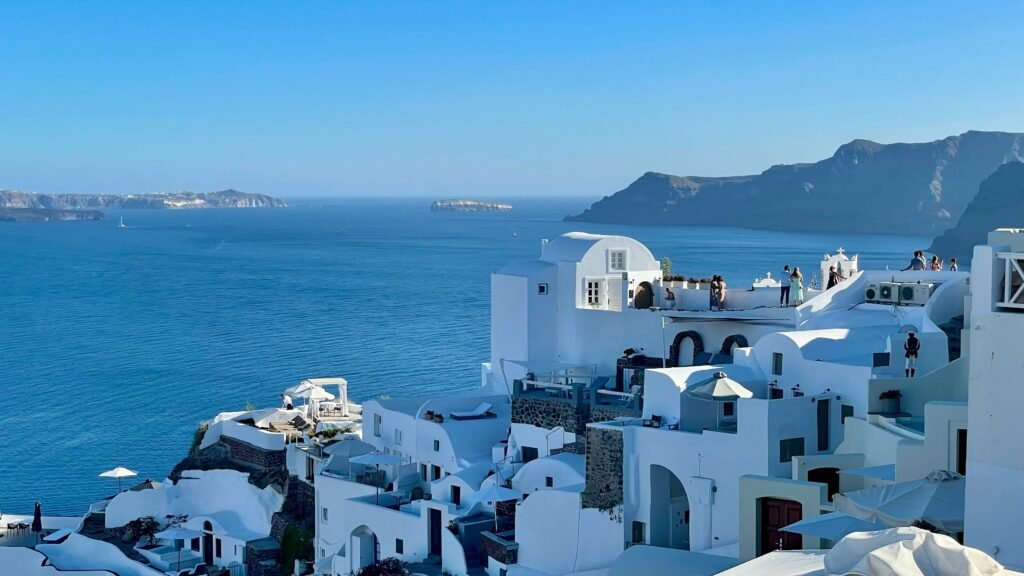 Oia: Captivating image of 
 a view from Oia with colorful skies.