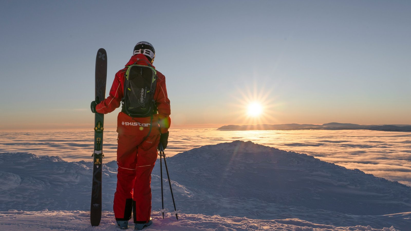 A Skier enjoying a ski day in the Nordic winter wonderland.